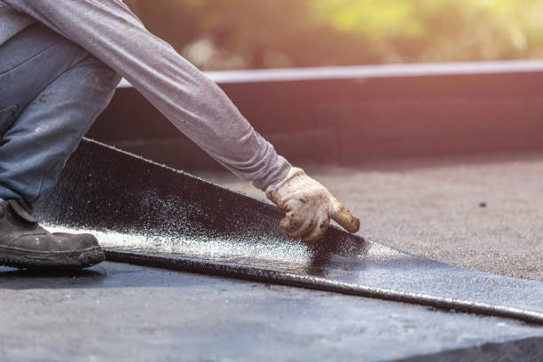 Professional Basement Waterproofing technician working in Tenafly, NJ